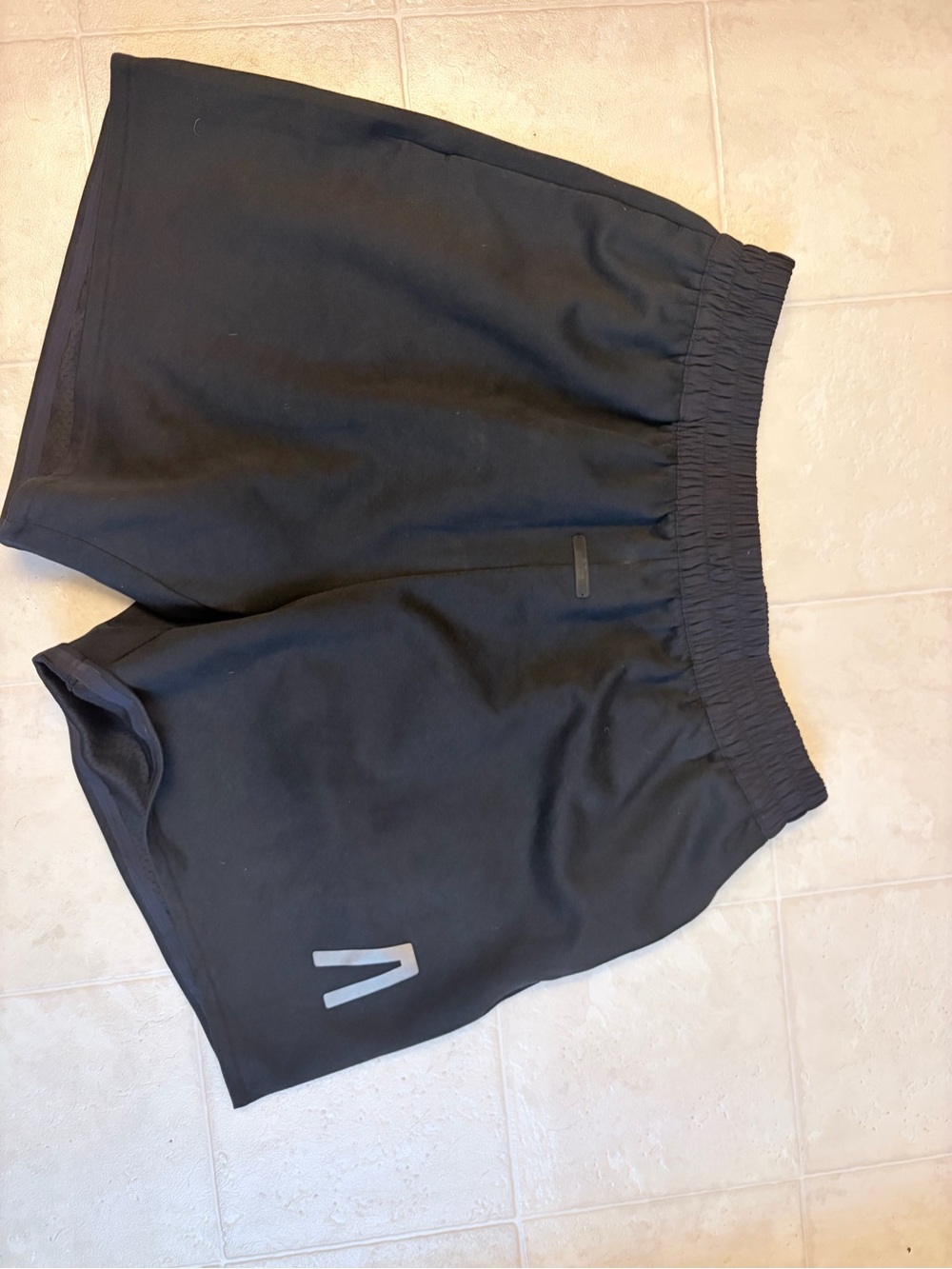 Fear of God Men's Black Athletic Shorts with Reflective Logo